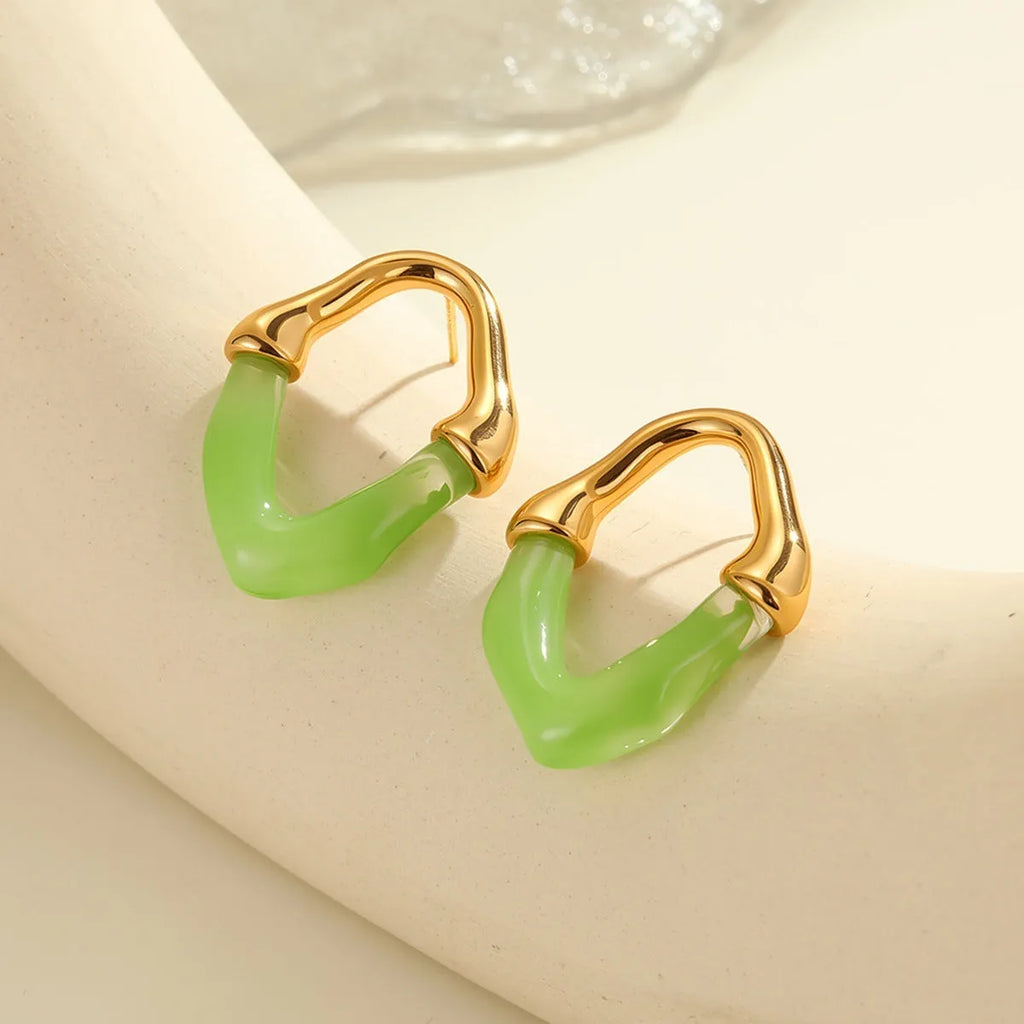 Stainless steel earrings with pink resin stitching and 18K gold plating