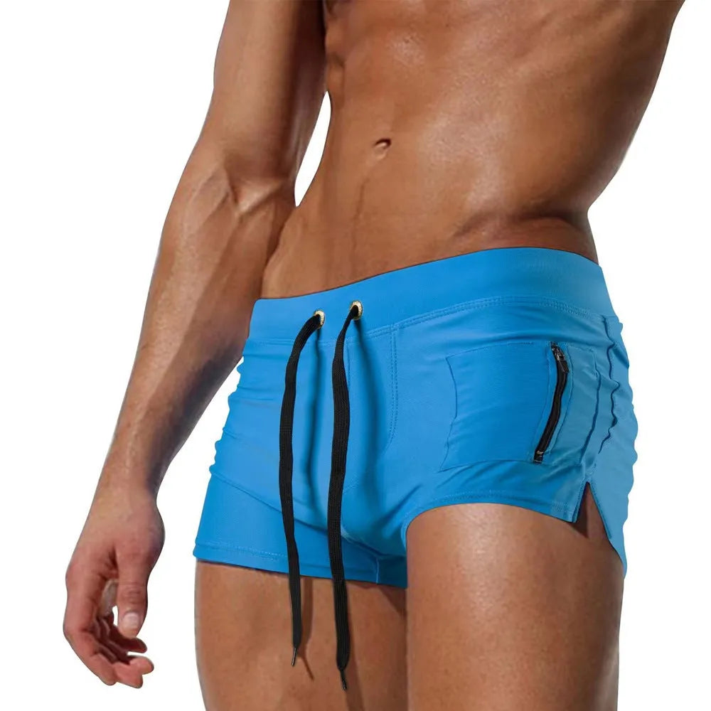 Men's high waist swimming trunks with front lace-up closure in solid colour options