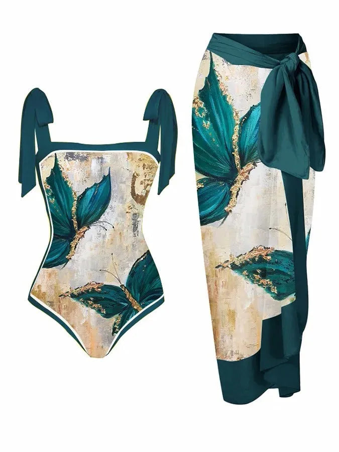 Women's floral print two-piece swimsuit with a sheer chiffon hip skirt, shown in one of the available colour variations.