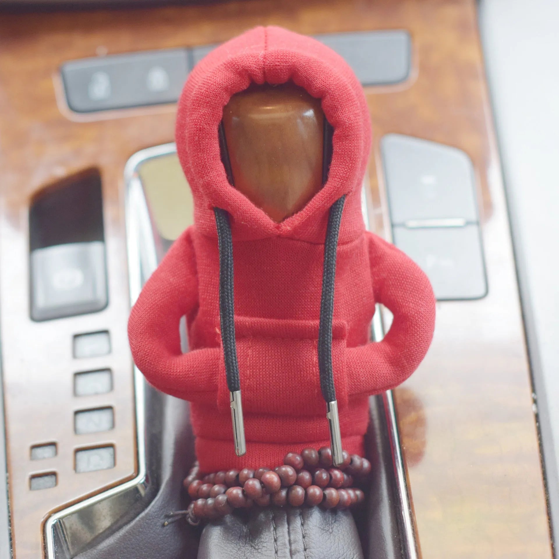 Dutch velvet car gear handle sleeve cover shown in various colours including black, red, blue, and pink.