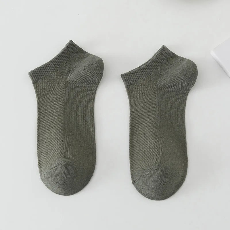 Solid colour low-cut boat socks for men made from polyester, shown in one of six available colours.
