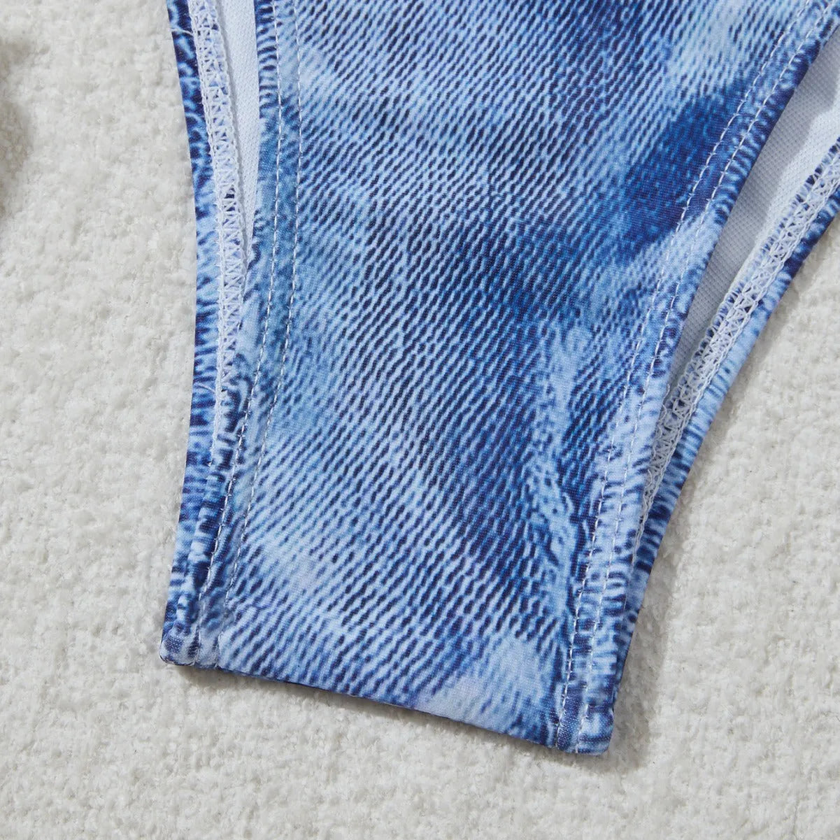Women's denim blue printed bikini swimsuit with decorative strap detailing