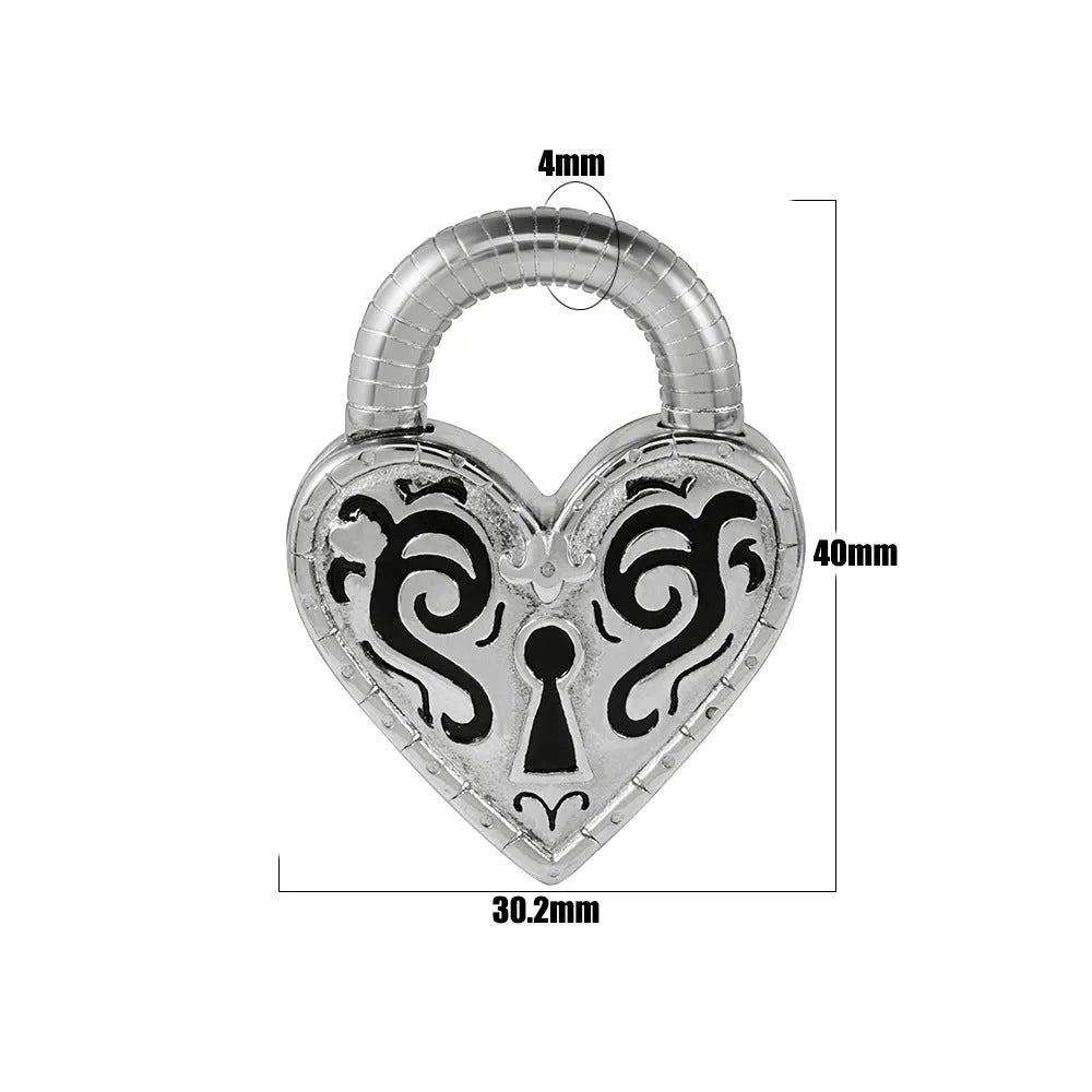 Heart-shaped stainless steel ear piercing stud with electroplated gold finish on white background