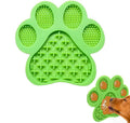 Blue silicone dog licking mat with bone texture and suction cups on back for bath time and slow feeding.
