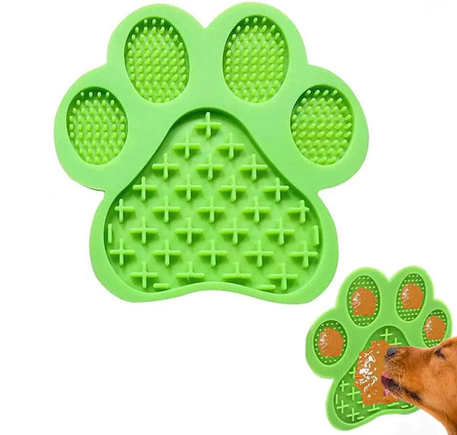 Blue silicone dog licking mat with bone texture and suction cups on back for bath time and slow feeding.