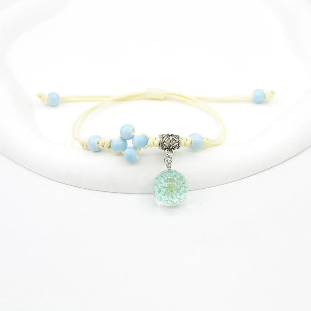 Women's hand-woven glass dried flower bracelet with large 1.4 cm beads in multiple colour options.