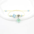 Women's hand-woven glass dried flower bracelet with large 1.4 cm beads in multiple colour options.