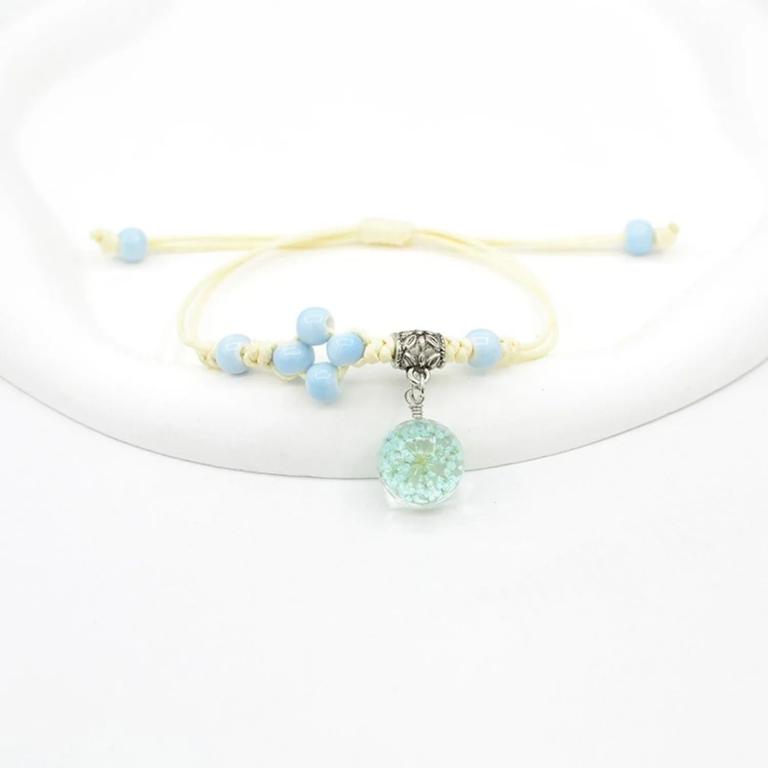 Women's hand-woven glass dried flower bracelet with large 1.4 cm beads in multiple colour options.