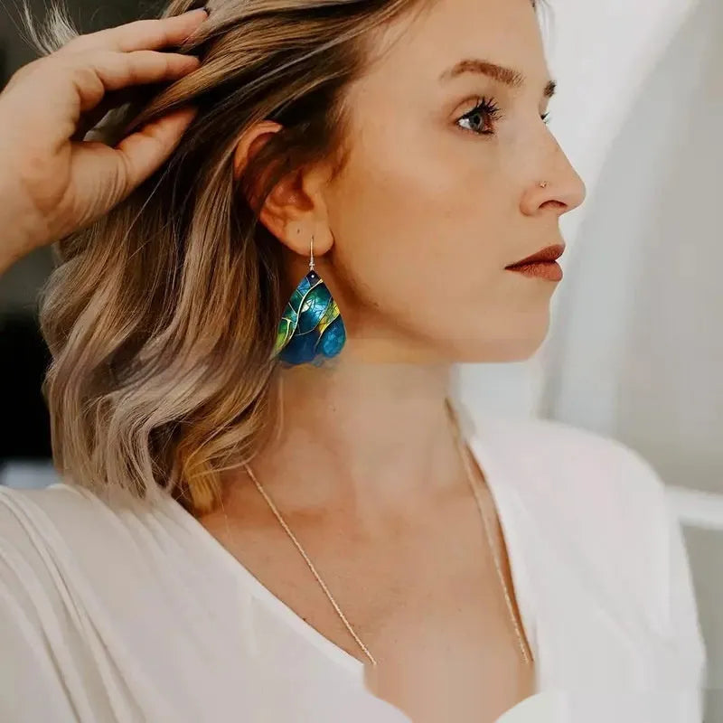 Acrylic drop earrings with intricate flat branch knot pattern design in two style variations