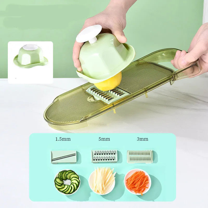 Transparent green multifunction vegetable cutter with stainless steel blades and 1.5L capacity chopping box