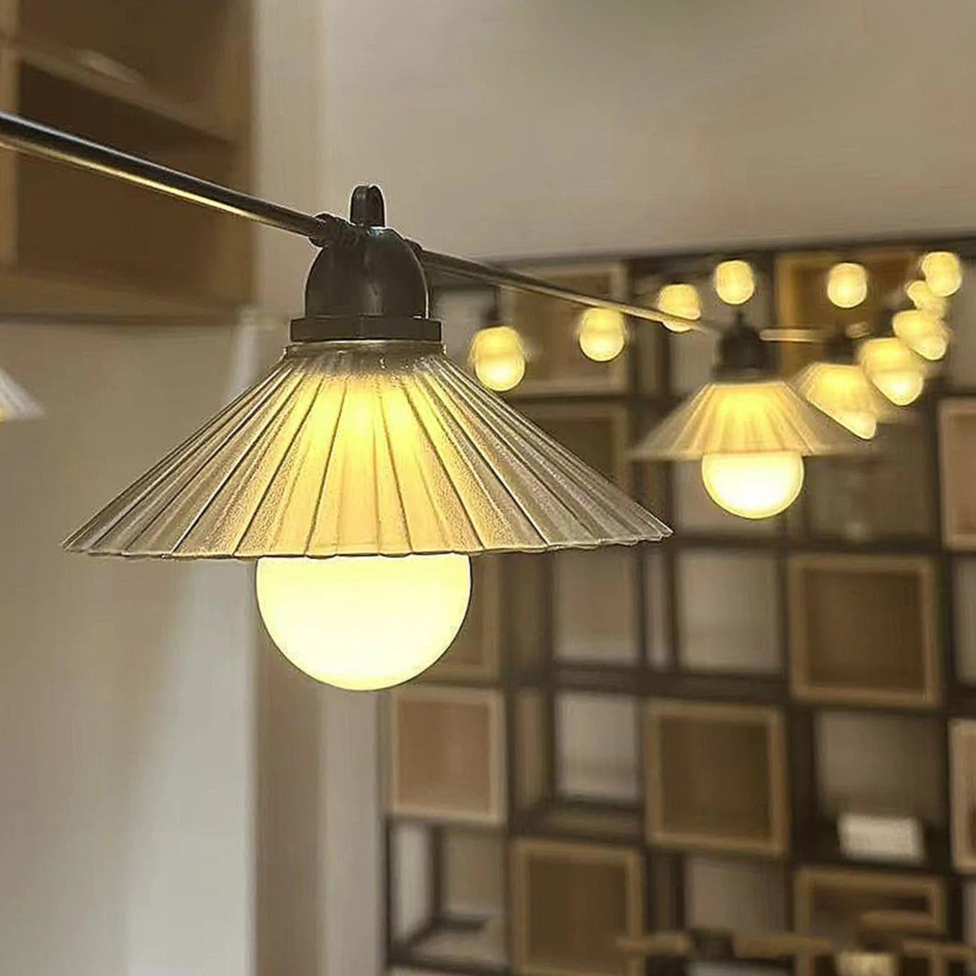 Outdoor LED string lights with flower-shaped bulbs showing warm white and coloured lighting options