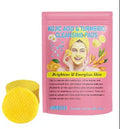 Yellow compressed turmeric cleansing pad with kojic acid, made of sponge material, for facial cleansing
