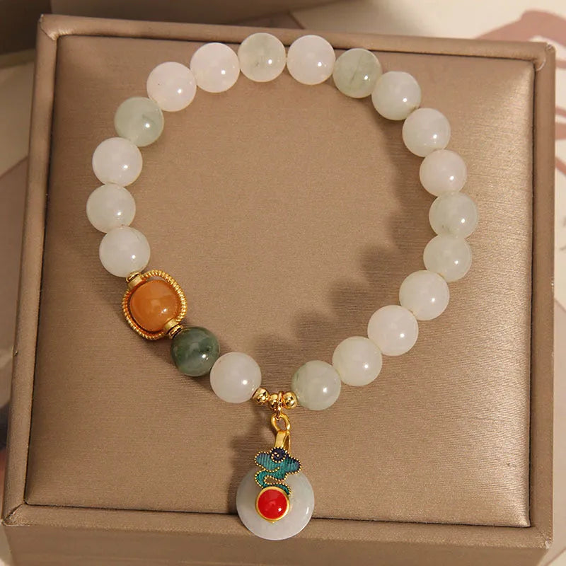 Ice jade bracelet with pearl decoration and Xiangyun peace buckle for women