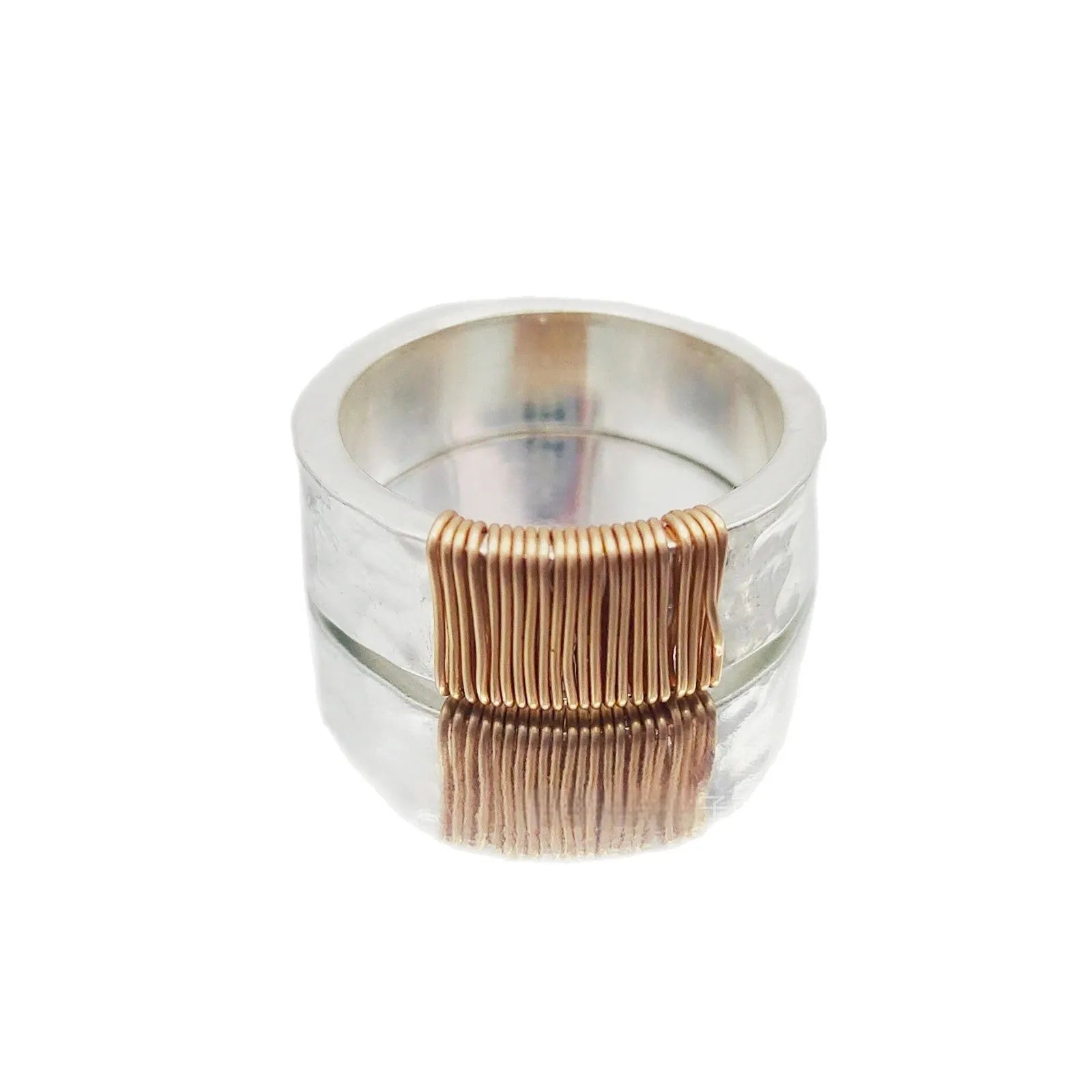 Copper geometric wide-face bracelet with irregular coil design in silver gold electroplated finish