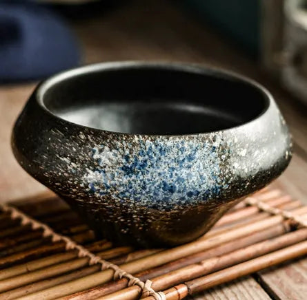 Ceramic Japanese soup bowl with stone conch shape and traditional Edo pattern design