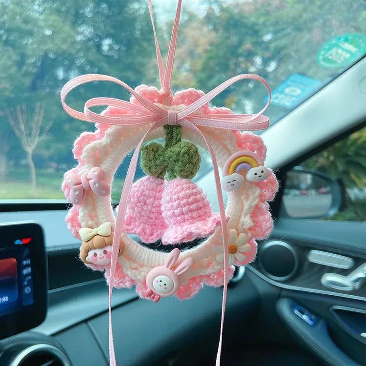 Handmade wool bell orchid car pendant hanging from rear-view mirror