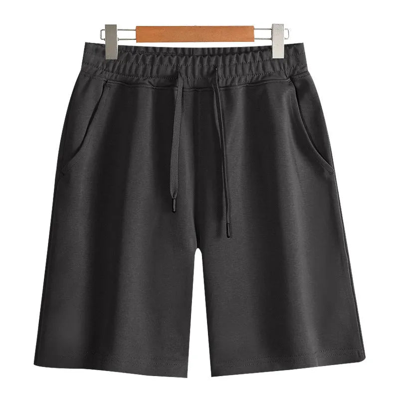 Straight-leg cotton sports shorts in light grey on a neutral background.