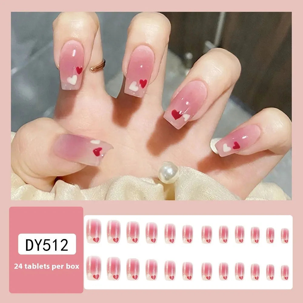 Red and white love gradient nail stickers with starry sky pattern and glue tube