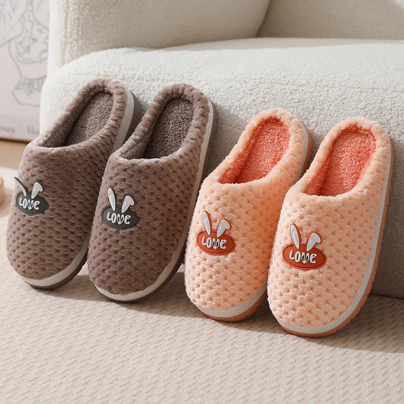 Women's plush rabbit plaid house slipper with thick sole, shown in a solid colour option.
