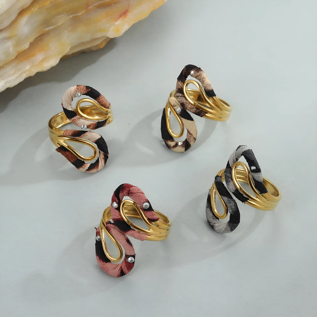 Leopard print stainless steel open ring with asymmetric geometric heart and star shapes