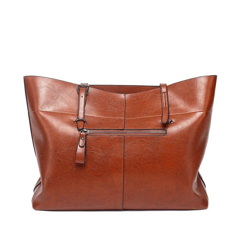 Horizontal waxed cowhide leather crossbody handbag for women showing internal compartments.