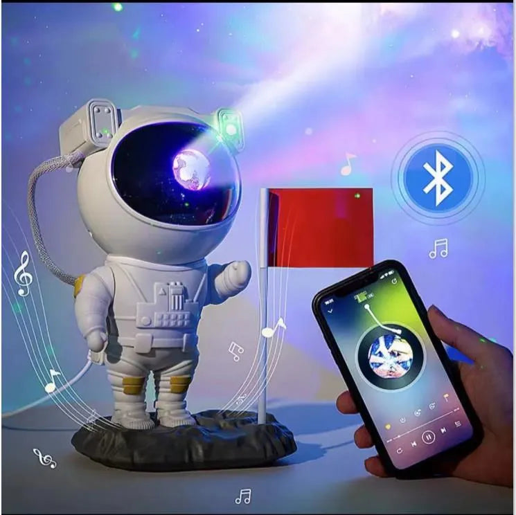 Creative astronaut galaxy starry sky projector nightlight on table with remote control, black finish