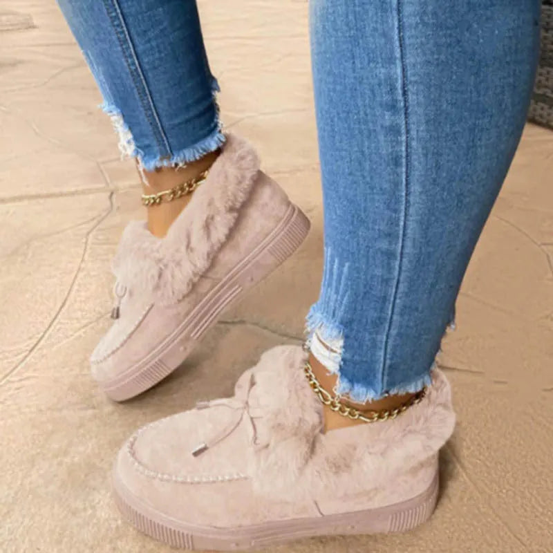 Cotton warm winter slippers with velvet lining and a non-slip rubber sole in a round-toe casual style.