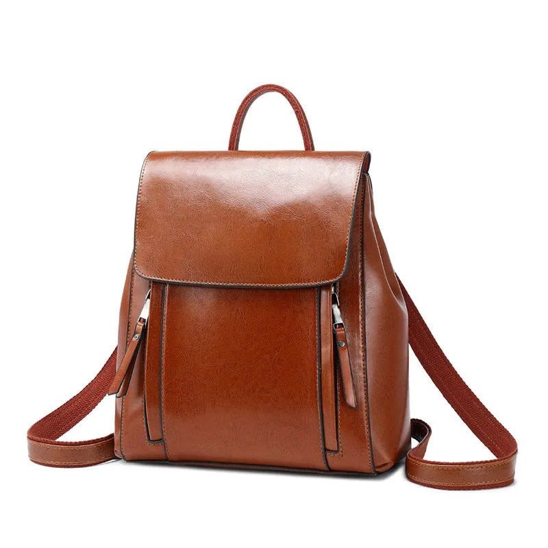 Genuine leather women's backpack in oil-wax cowhide with multiple internal pockets and compartments