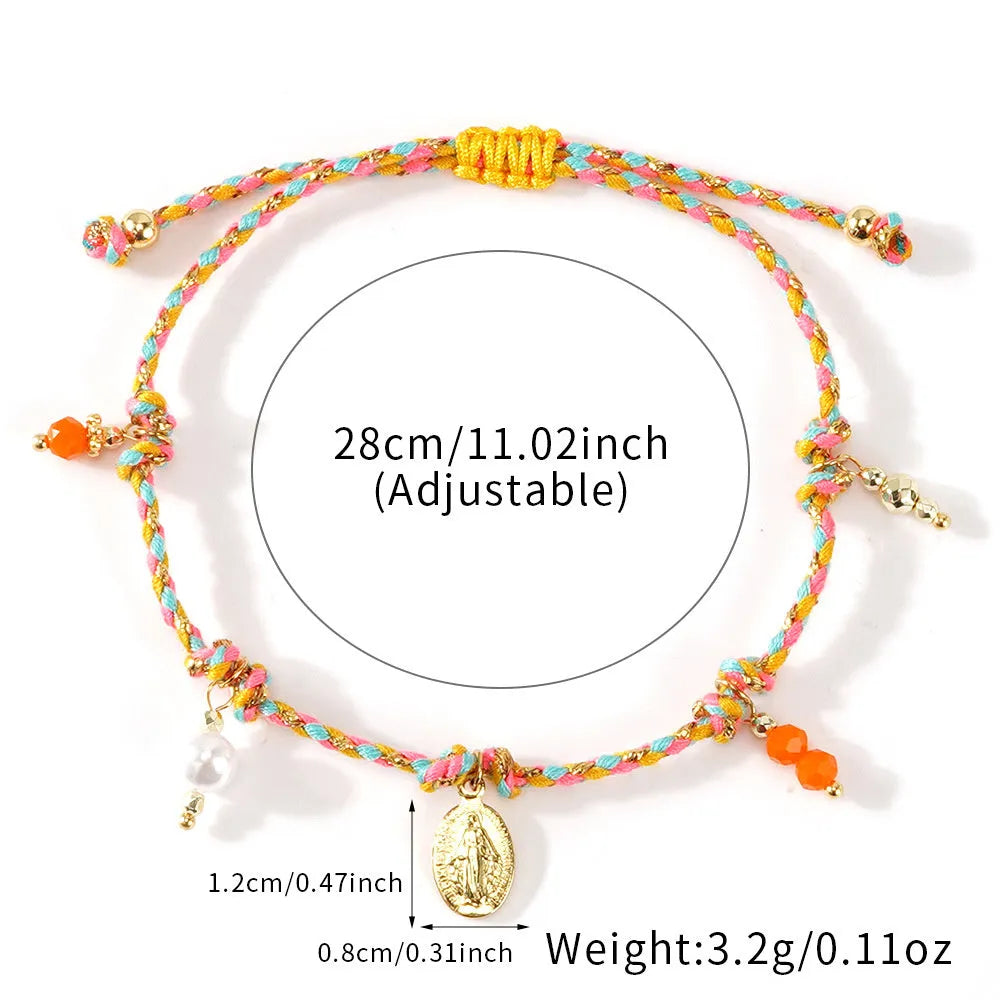 Hand-woven women's bracelet made from colourful braided rope with an integrated carrying strap tag design.