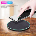 Black Qi wireless charging pad for iPhone 11 with magnetic alignment system
