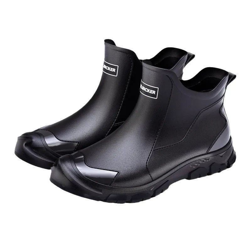 PVC outdoor wading boots in beige and black with red, showing round toe and non-slip plastic sole.
