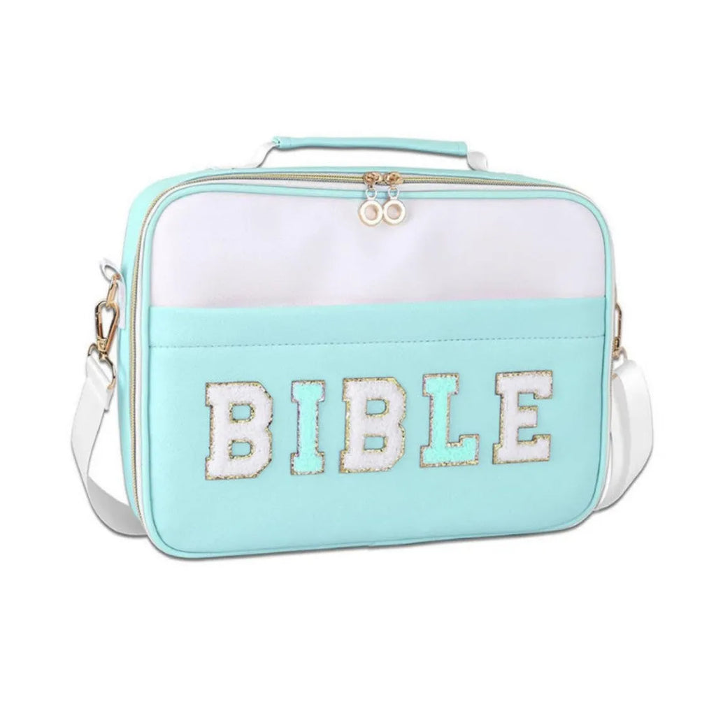PU letter-pattern book handbag in light blue, 30.5x23 cm, with zippered top, on a white background