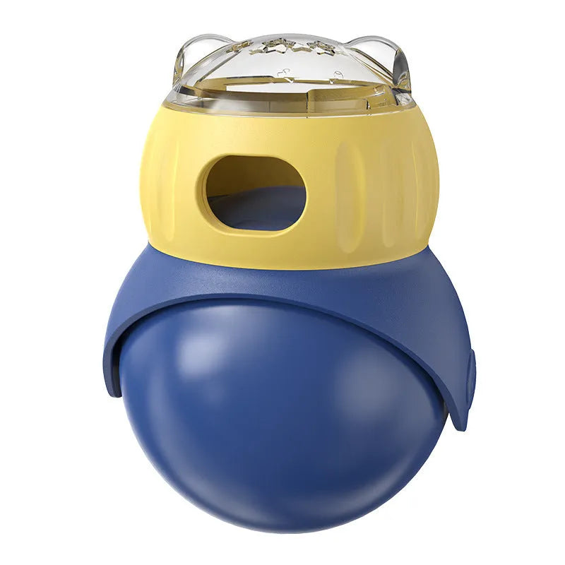 Yellow and blue owl-shaped plastic cat puzzle feeder with a food tumbler mechanism.