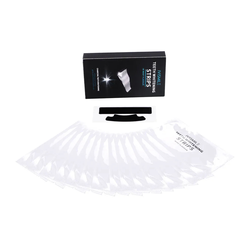 Box of 14 pairs of teeth whitening strips with coconut activated carbon and sodium bicarbonate, in aluminium film bags