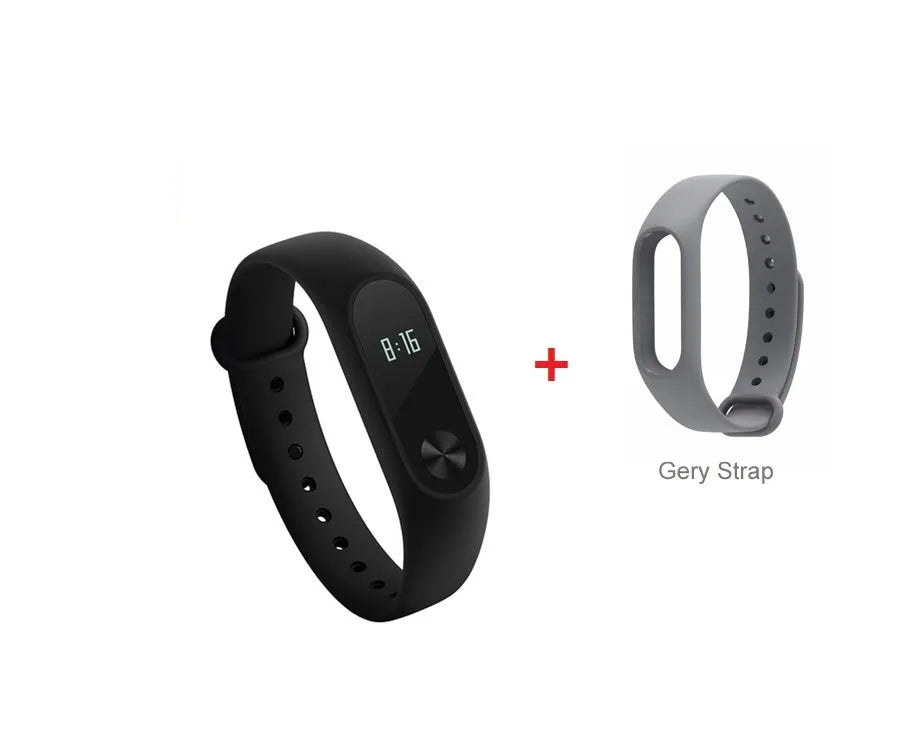 Black Xiaomi Mi Band 2 fitness tracker on wrist showing OLED display with heart rate reading