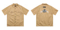 Men's cotton blend pocket work shirt in black or khaki with half sleeves and loose fit