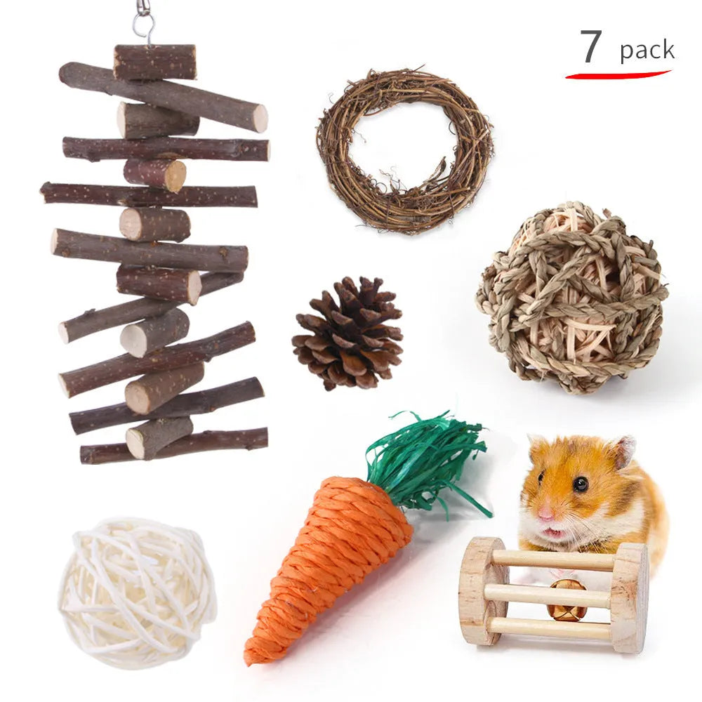 Assortment of natural wooden and woven chew toys for small pets like rabbits and parrots.
