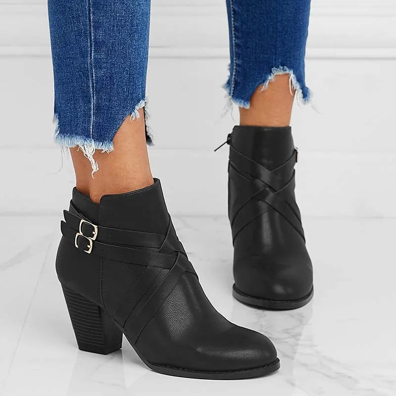 Grey plus size women's ankle boots with 7cm heel, side zip and belt buckle.