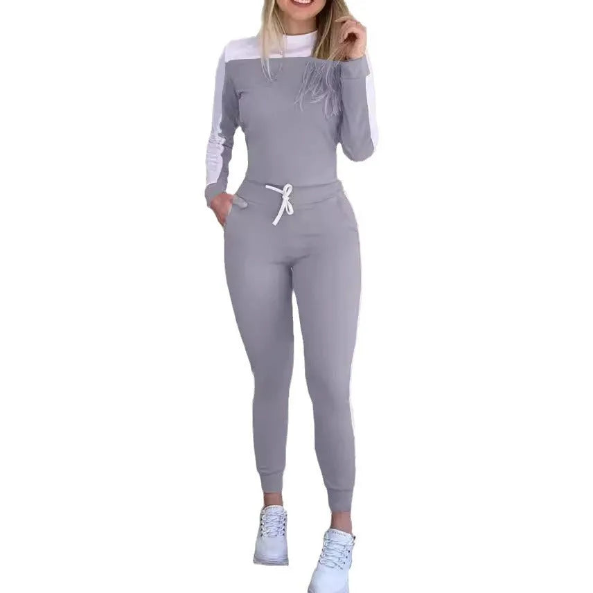 Women's colour matching long sleeve tight casual suit in black with pockets and matching trousers