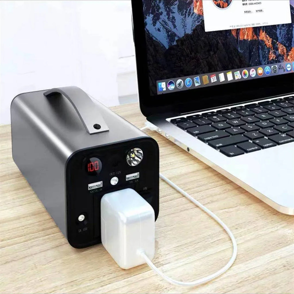 Portable 45000mAh power station with AC DC USB outputs and solar input in black colour