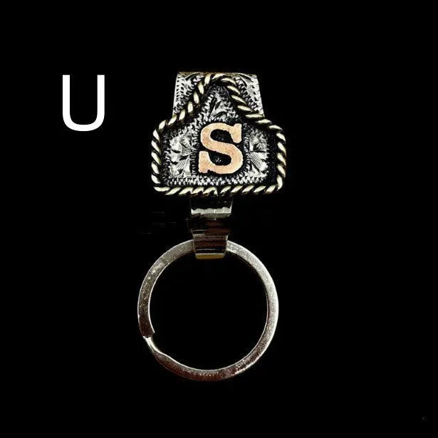 Handmade metal cow tag belt keychain in a selected colour from the A-Z letter range.