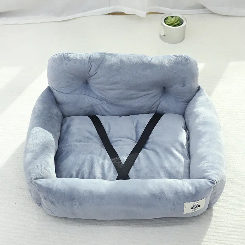 Grey and blue plaid cloth dog car travel nest carriers in two sizes for pet outings.