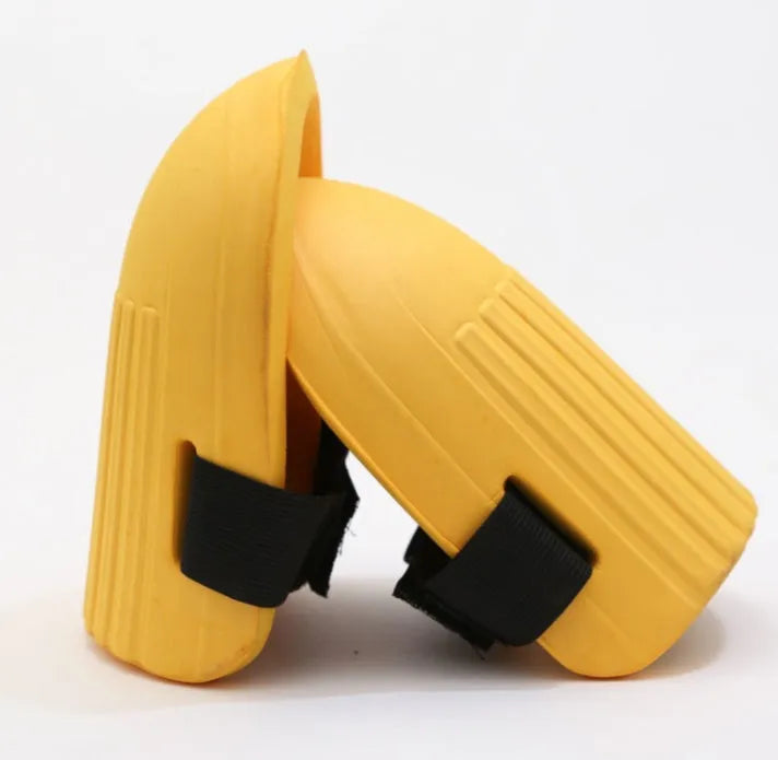 A pair of high-density EVA foam knee pads in army green, shown with dimensions for gardening and work protection.