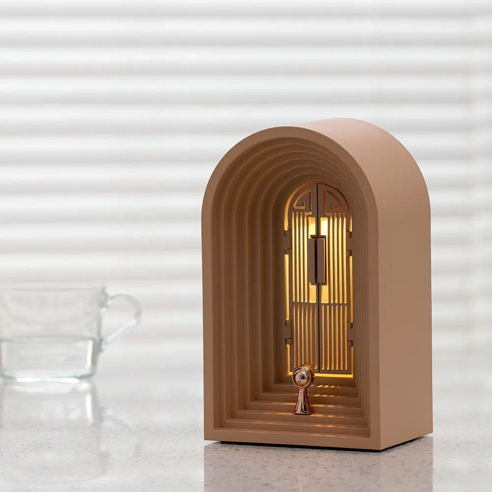 Nordic LED table lamp with Bluetooth speaker in white, plastic shade, compact bedside design