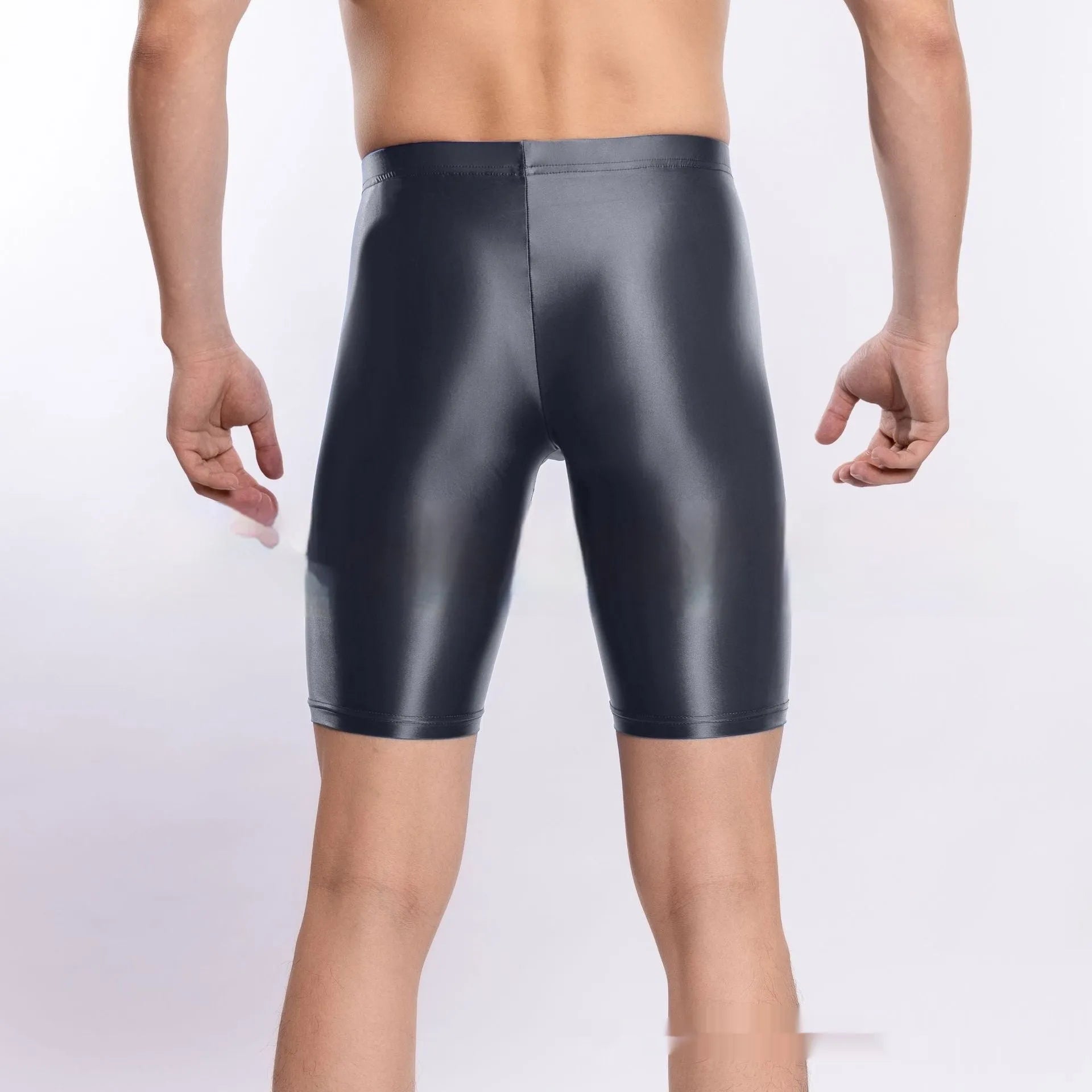 Plus size men's shiny silky nylon sports shorts shown in multiple colours including black, red, and fluorescent green
