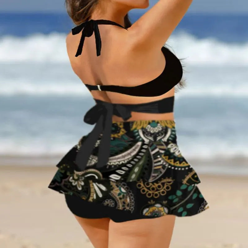 Women's purple bikini set with matching skirt showing lace-up detailing and high-waist styling