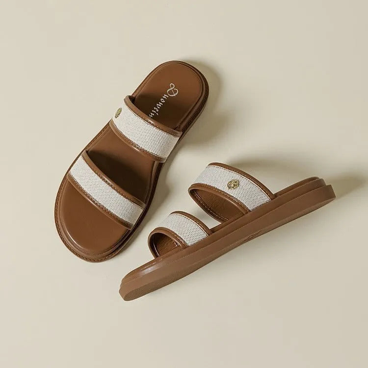 Brown women's vintage style flip-flop slippers with a soft bottom and artificial PU upper.