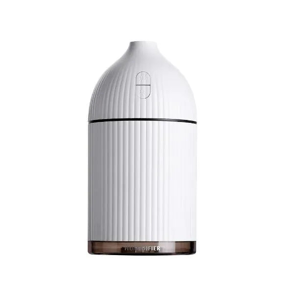 White USB aromatherapy diffuser humidifier with 300ml capacity and LED light on wooden table