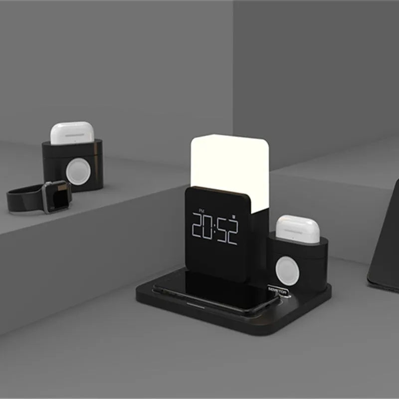 Dark green 3-in-1 wireless charging stand for phone, watch, and earbuds on a wooden table.