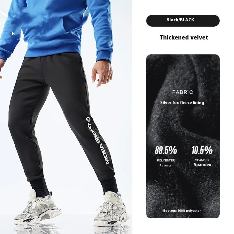 Men's black air layer ankle-tied sweatpants showing mid waist design and adjustable ankle ties